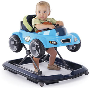 Мальчик в ходунках Мальчик в ходунках-машинке